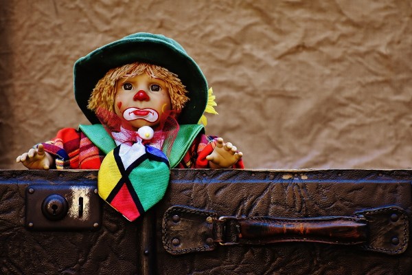 Clown in suitcase - how can I leave you again?